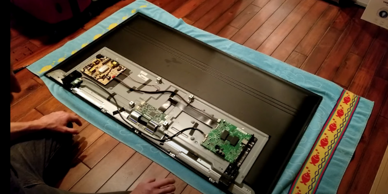 Disassemble your TCL TV's back paneling.