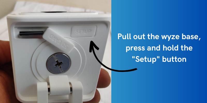 Pull out the wyze base, press and hold the "Setup" button